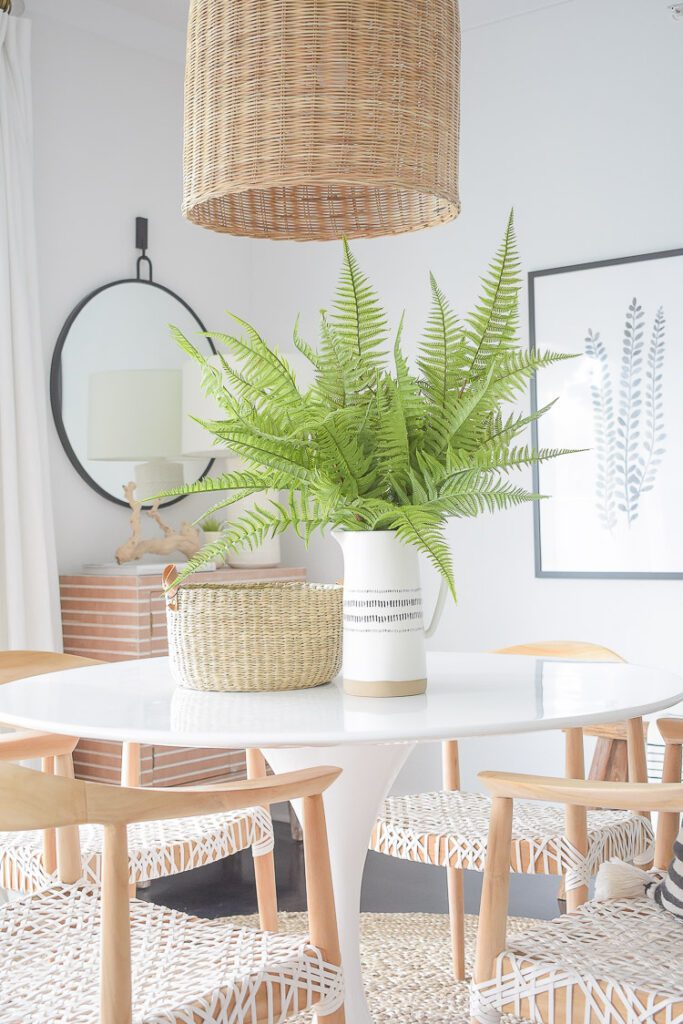 best-faux-fern-stems-pics-large-boho-pitcher-woven-basket-leather-handles-tulip-table-boho-chic-summer-dining-room-wooden-chair-white-leather-seat-3